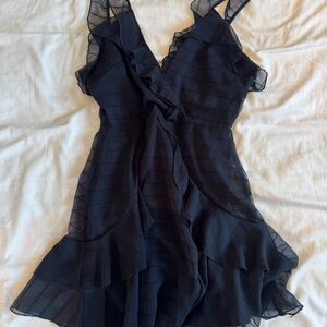 Chic Asymmetrical Black Dress with Ruffle Details